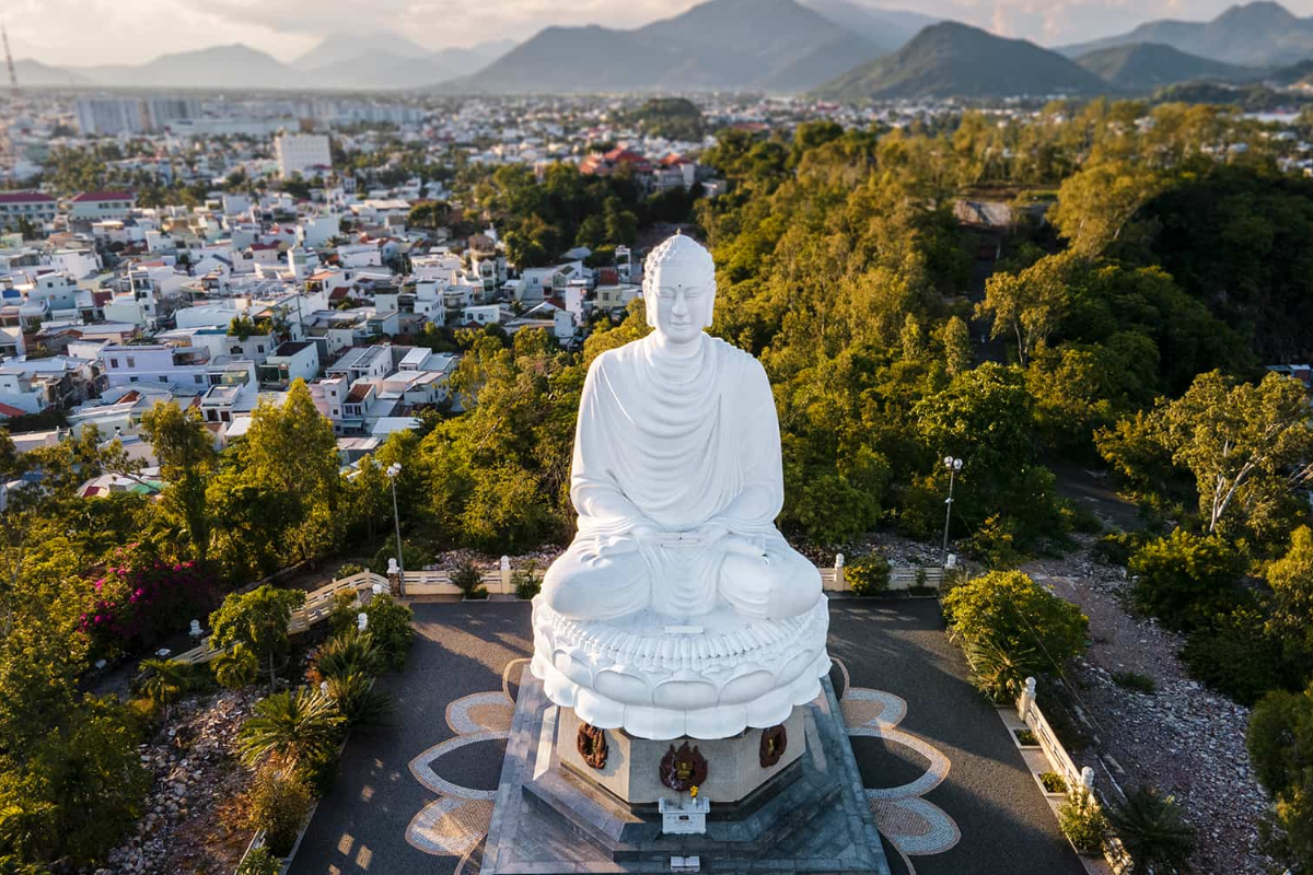 White Buddha statue at Long Son Pagoda in Nha Trang overlooking the city